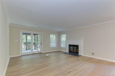 Welcome to this inviting 3-bedroom, 2.5-bath end-unit townhome on Kingsmill Resort and Golf Club in Virginia - for sale on GolfHomes.com, golf home, golf lot