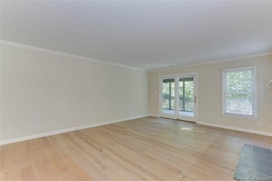 Welcome to this inviting 3-bedroom, 2.5-bath end-unit townhome on Kingsmill Resort and Golf Club in Virginia - for sale on GolfHomes.com, golf home, golf lot