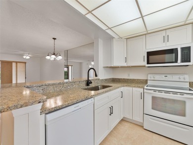 One or more photo(s) has been virtually staged. **WELCOME HOME** on Kings Point Executive Golf Course in Florida - for sale on GolfHomes.com, golf home, golf lot