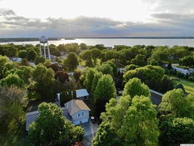 This stunning 3.7-acre in-town acreage offers the perfect blend on Oak Hills Golf Course in Iowa - for sale on GolfHomes.com, golf home, golf lot