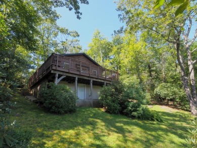 Welcome to a move-in ready charming cabin that is tucked into on Skyland Lakes Golf Course in Virginia - for sale on GolfHomes.com, golf home, golf lot