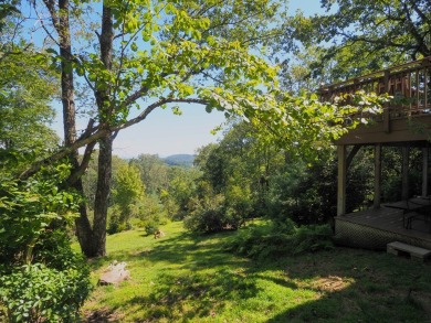 Welcome to a move-in ready charming cabin that is tucked into on Skyland Lakes Golf Course in Virginia - for sale on GolfHomes.com, golf home, golf lot