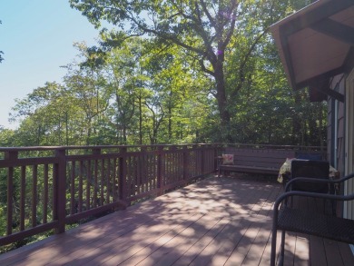Welcome to a move-in ready charming cabin that is tucked into on Skyland Lakes Golf Course in Virginia - for sale on GolfHomes.com, golf home, golf lot