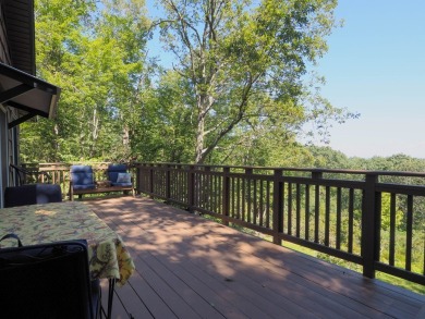 Welcome to a move-in ready charming cabin that is tucked into on Skyland Lakes Golf Course in Virginia - for sale on GolfHomes.com, golf home, golf lot