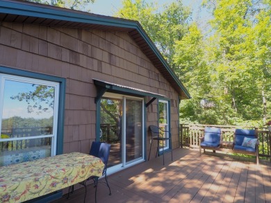 Welcome to a move-in ready charming cabin that is tucked into on Skyland Lakes Golf Course in Virginia - for sale on GolfHomes.com, golf home, golf lot