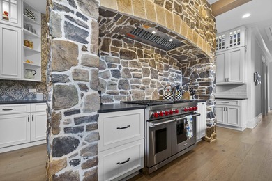 Welcome to this beautiful custom-built, 4-bedroom, 4.5-bath lake on Reynolds Lake Oconee - The Oconee in Georgia - for sale on GolfHomes.com, golf home, golf lot