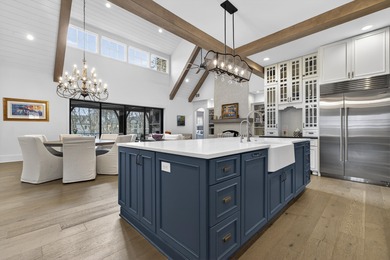 Welcome to this beautiful custom-built, 4-bedroom, 4.5-bath lake on Reynolds Lake Oconee - The Oconee in Georgia - for sale on GolfHomes.com, golf home, golf lot