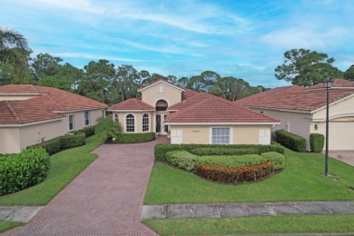 BREATHTAKING GOLF & WATER VIEWS! Experience refined living in on The Legacy Golf and Tennis Club in Florida - for sale on GolfHomes.com, golf home, golf lot