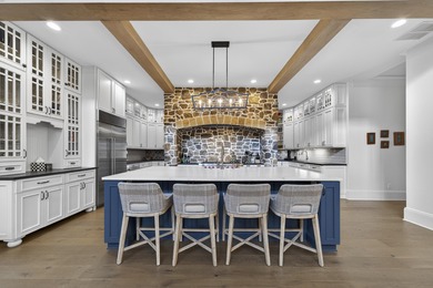 Welcome to this beautiful custom-built, 4-bedroom, 4.5-bath lake on Reynolds Lake Oconee - The Oconee in Georgia - for sale on GolfHomes.com, golf home, golf lot