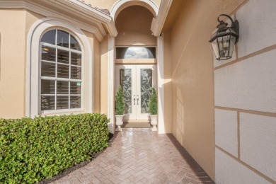 BREATHTAKING GOLF & WATER VIEWS! Experience refined living in on The Legacy Golf and Tennis Club in Florida - for sale on GolfHomes.com, golf home, golf lot