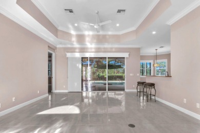 BREATHTAKING GOLF & WATER VIEWS! Experience refined living in on The Legacy Golf and Tennis Club in Florida - for sale on GolfHomes.com, golf home, golf lot