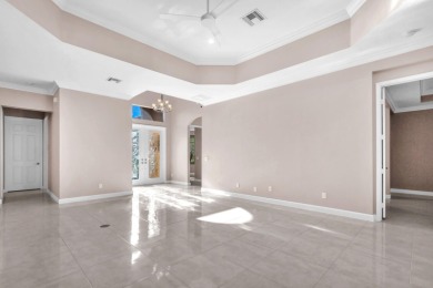 BREATHTAKING GOLF & WATER VIEWS! Experience refined living in on The Legacy Golf and Tennis Club in Florida - for sale on GolfHomes.com, golf home, golf lot