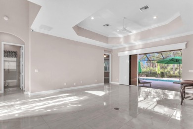 BREATHTAKING GOLF & WATER VIEWS! Experience refined living in on The Legacy Golf and Tennis Club in Florida - for sale on GolfHomes.com, golf home, golf lot
