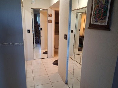 I'm screaming there's Nothing lacking here!  You name it on Pembroke Lakes Golf Club in Florida - for sale on GolfHomes.com, golf home, golf lot