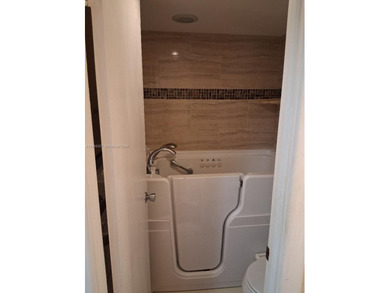 I'm screaming there's Nothing lacking here!  You name it on Pembroke Lakes Golf Club in Florida - for sale on GolfHomes.com, golf home, golf lot