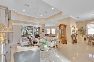 BREATHTAKING GOLF & WATER VIEWS! Experience refined living in on The Legacy Golf and Tennis Club in Florida - for sale on GolfHomes.com, golf home, golf lot