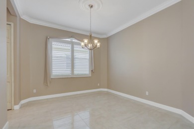BREATHTAKING GOLF & WATER VIEWS! Experience refined living in on The Legacy Golf and Tennis Club in Florida - for sale on GolfHomes.com, golf home, golf lot