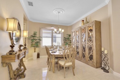 BREATHTAKING GOLF & WATER VIEWS! Experience refined living in on The Legacy Golf and Tennis Club in Florida - for sale on GolfHomes.com, golf home, golf lot