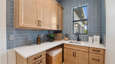 Brand new furnished model by Lifestyle Homes in prestigious Bent on Bent Pine Golf Club in Florida - for sale on GolfHomes.com, golf home, golf lot