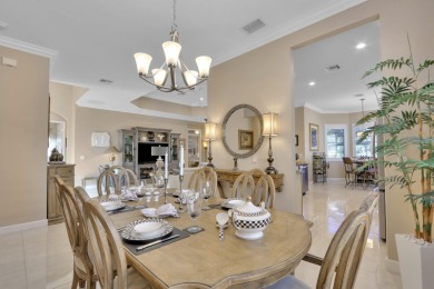 BREATHTAKING GOLF & WATER VIEWS! Experience refined living in on The Legacy Golf and Tennis Club in Florida - for sale on GolfHomes.com, golf home, golf lot