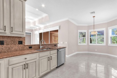 BREATHTAKING GOLF & WATER VIEWS! Experience refined living in on The Legacy Golf and Tennis Club in Florida - for sale on GolfHomes.com, golf home, golf lot
