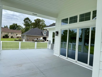 Timeless Craftsman Home in Manning's Premier Waterfront on Players Course At Wyboo Plantation in South Carolina - for sale on GolfHomes.com, golf home, golf lot