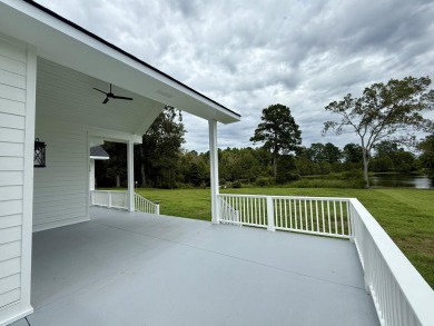 Timeless Craftsman Home in Manning's Premier Waterfront on Players Course At Wyboo Plantation in South Carolina - for sale on GolfHomes.com, golf home, golf lot