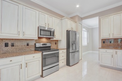 BREATHTAKING GOLF & WATER VIEWS! Experience refined living in on The Legacy Golf and Tennis Club in Florida - for sale on GolfHomes.com, golf home, golf lot