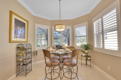 BREATHTAKING GOLF & WATER VIEWS! Experience refined living in on The Legacy Golf and Tennis Club in Florida - for sale on GolfHomes.com, golf home, golf lot