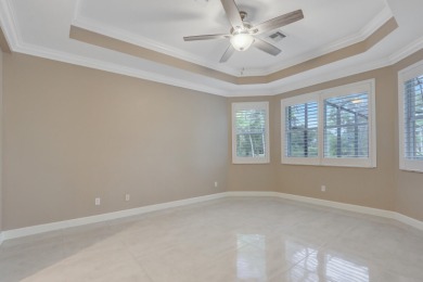 BREATHTAKING GOLF & WATER VIEWS! Experience refined living in on The Legacy Golf and Tennis Club in Florida - for sale on GolfHomes.com, golf home, golf lot