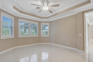 BREATHTAKING GOLF & WATER VIEWS! Experience refined living in on The Legacy Golf and Tennis Club in Florida - for sale on GolfHomes.com, golf home, golf lot