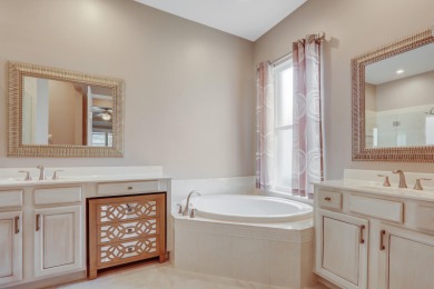BREATHTAKING GOLF & WATER VIEWS! Experience refined living in on The Legacy Golf and Tennis Club in Florida - for sale on GolfHomes.com, golf home, golf lot