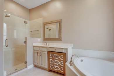 BREATHTAKING GOLF & WATER VIEWS! Experience refined living in on The Legacy Golf and Tennis Club in Florida - for sale on GolfHomes.com, golf home, golf lot