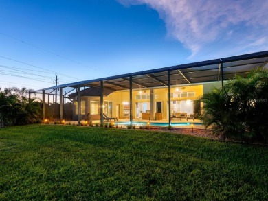 Extraordinary lakefront estate home! Entering through the 8-foot on Venetian Golf and River Club in Florida - for sale on GolfHomes.com, golf home, golf lot