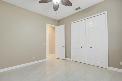 BREATHTAKING GOLF & WATER VIEWS! Experience refined living in on The Legacy Golf and Tennis Club in Florida - for sale on GolfHomes.com, golf home, golf lot