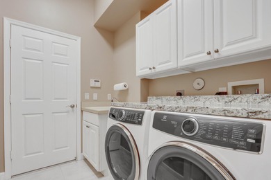 BREATHTAKING GOLF & WATER VIEWS! Experience refined living in on The Legacy Golf and Tennis Club in Florida - for sale on GolfHomes.com, golf home, golf lot