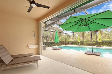 BREATHTAKING GOLF & WATER VIEWS! Experience refined living in on The Legacy Golf and Tennis Club in Florida - for sale on GolfHomes.com, golf home, golf lot