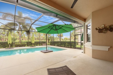 BREATHTAKING GOLF & WATER VIEWS! Experience refined living in on The Legacy Golf and Tennis Club in Florida - for sale on GolfHomes.com, golf home, golf lot