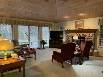 All the best of care-free condo living! Great room with gas on Michaywe Pines Course in Michigan - for sale on GolfHomes.com, golf home, golf lot