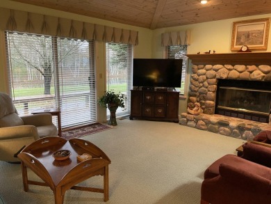 All the best of care-free condo living! Great room with gas on Michaywe Pines Course in Michigan - for sale on GolfHomes.com, golf home, golf lot