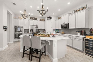 Welcome to your dream home in the highly desirable Watermark on Orange County National Golf Center and Lodge in Florida - for sale on GolfHomes.com, golf home, golf lot