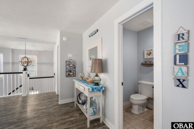 This vacation rental home is a spacious 4-bedroom, 4.5-bathroom on The Currituck Golf Club in North Carolina - for sale on GolfHomes.com, golf home, golf lot