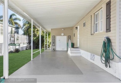 Welcome to your stunning 2-bedroom, 2-bath mobile home in the on Davie Golf Club in Florida - for sale on GolfHomes.com, golf home, golf lot