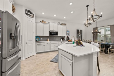Welcome to your dream home in the highly desirable Watermark on Orange County National Golf Center and Lodge in Florida - for sale on GolfHomes.com, golf home, golf lot