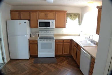 LOCATION, LOCATION, LOCATION! Just minutes from Lake Sumter on El Santiago Executive Golf Course in Florida - for sale on GolfHomes.com, golf home, golf lot