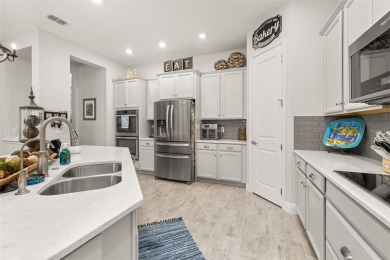 Welcome to your dream home in the highly desirable Watermark on Orange County National Golf Center and Lodge in Florida - for sale on GolfHomes.com, golf home, golf lot