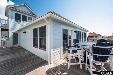 This vacation rental home is a spacious 4-bedroom, 4.5-bathroom on The Currituck Golf Club in North Carolina - for sale on GolfHomes.com, golf home, golf lot