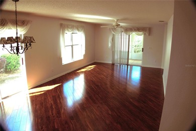 LOCATION, LOCATION, LOCATION! Just minutes from Lake Sumter on El Santiago Executive Golf Course in Florida - for sale on GolfHomes.com, golf home, golf lot