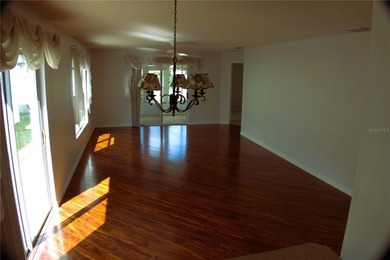 LOCATION, LOCATION, LOCATION! Just minutes from Lake Sumter on El Santiago Executive Golf Course in Florida - for sale on GolfHomes.com, golf home, golf lot