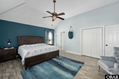 This vacation rental home is a spacious 4-bedroom, 4.5-bathroom on The Currituck Golf Club in North Carolina - for sale on GolfHomes.com, golf home, golf lot